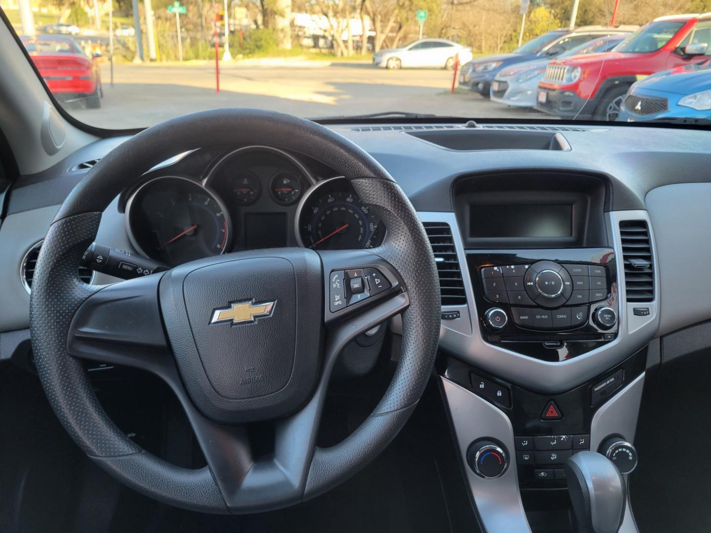 2014 Red Chevrolet Cruze LS Auto (1G1PA5SH8E7) with an 1.8L L4 DOHC 16V FFV engine, 6-Speed Automatic transmission, located at 503 West Court, Seguin, TX, 78155, (830) 379-3373, 29.568621, -97.969803 - Photo#5